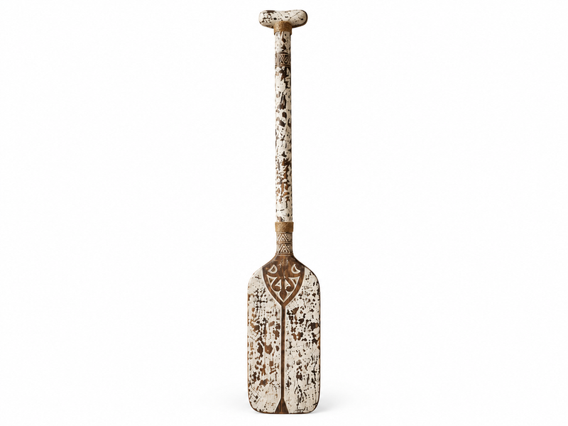 Wooden decorative paddle in a patinated white finish, patterns engraved on the blade and shaft