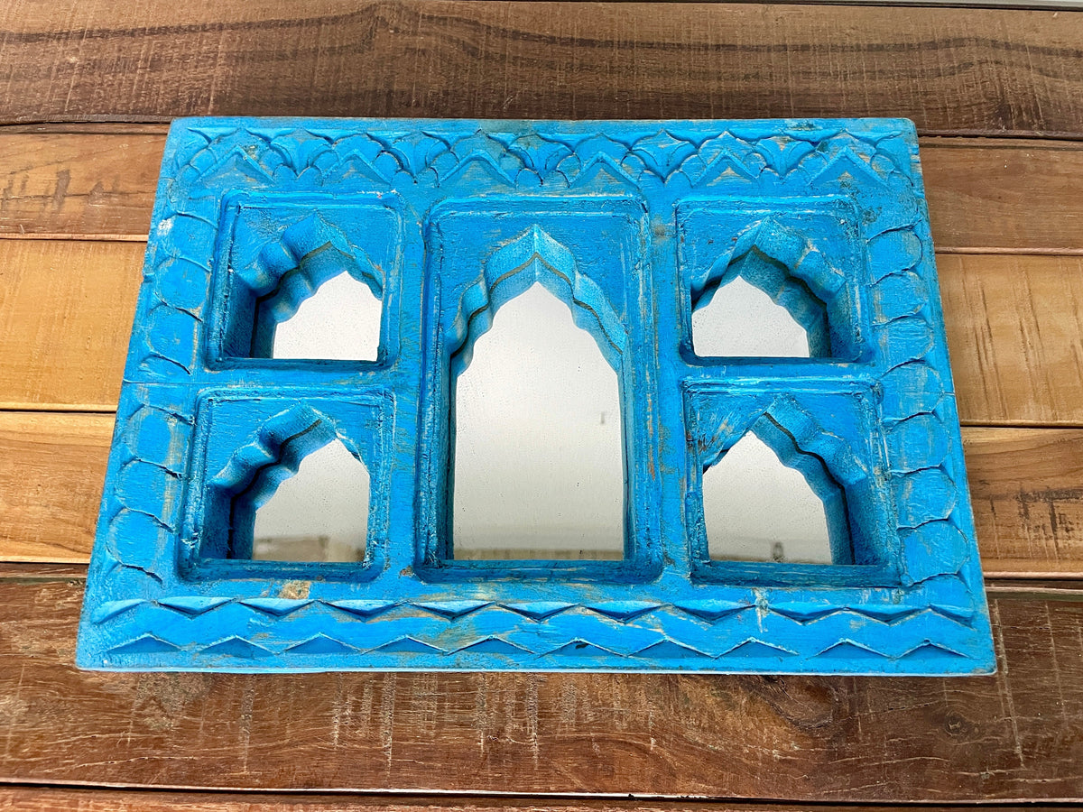 Miroir sculpté