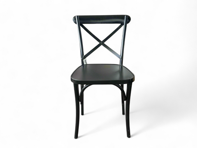 Black metal chair seen from the front, crossed back