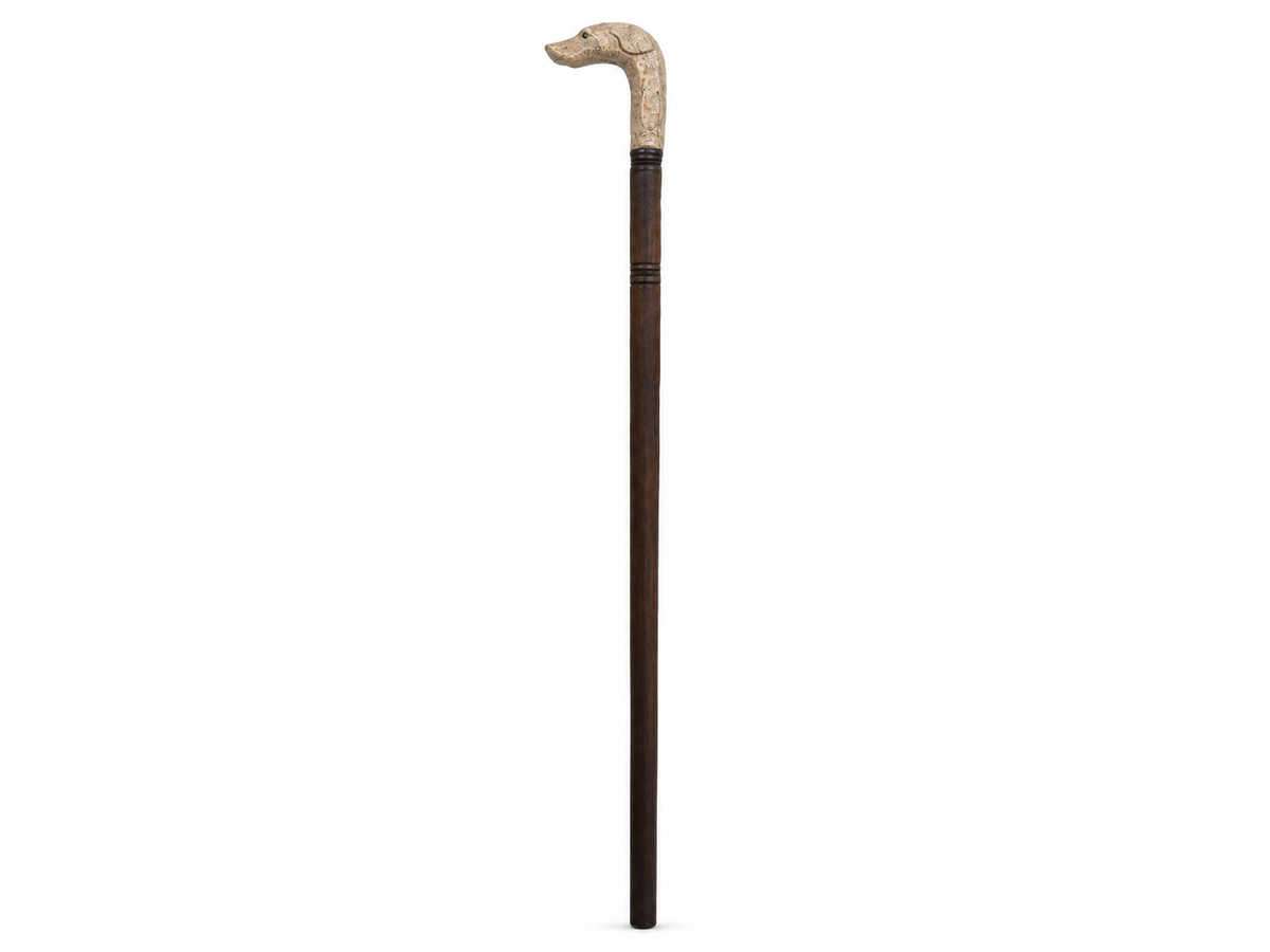 Canne de marche entière, fût en bois foncé et pommeau sculpté